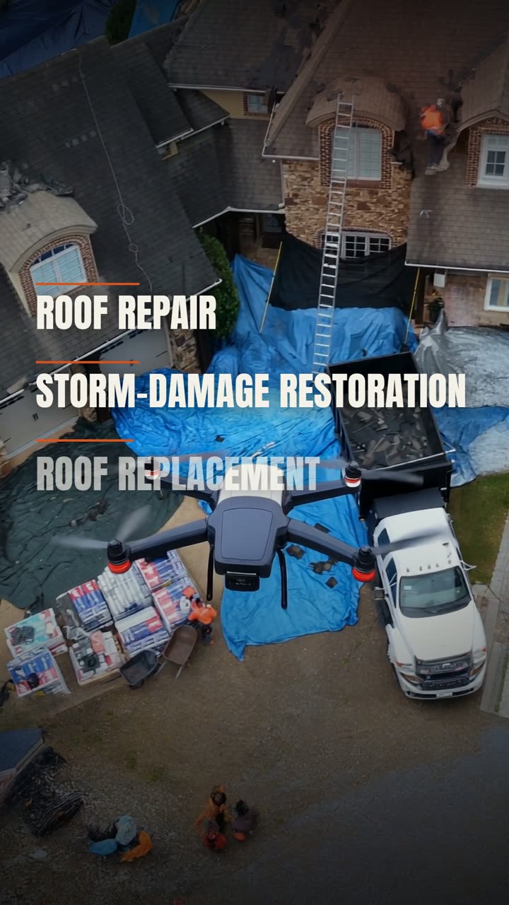 Frame from the Elite Catastrophe roofing reel — overhead view of a tarped roof and a crew working